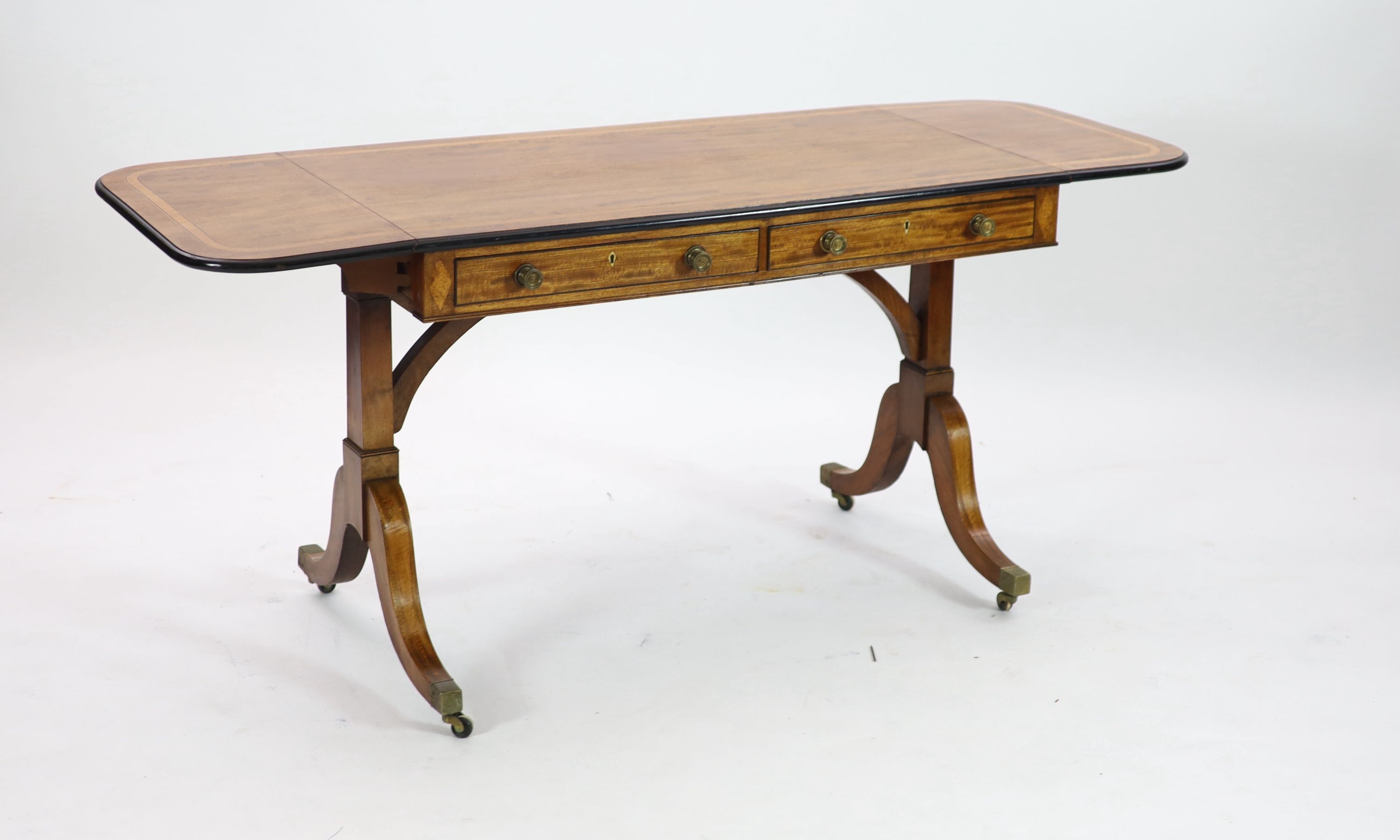 A late George III satinwood banded mahogany sofa table, W.108cm D.59cm H.74cm